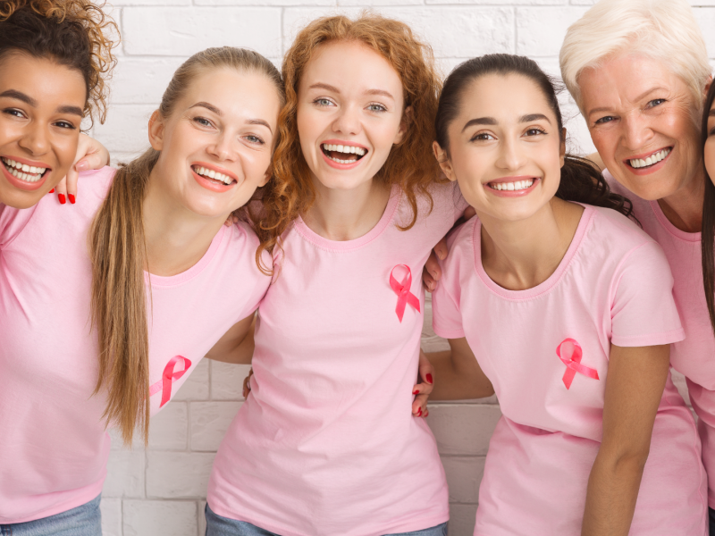 Women promoting the importance of scheduling a mammogram.